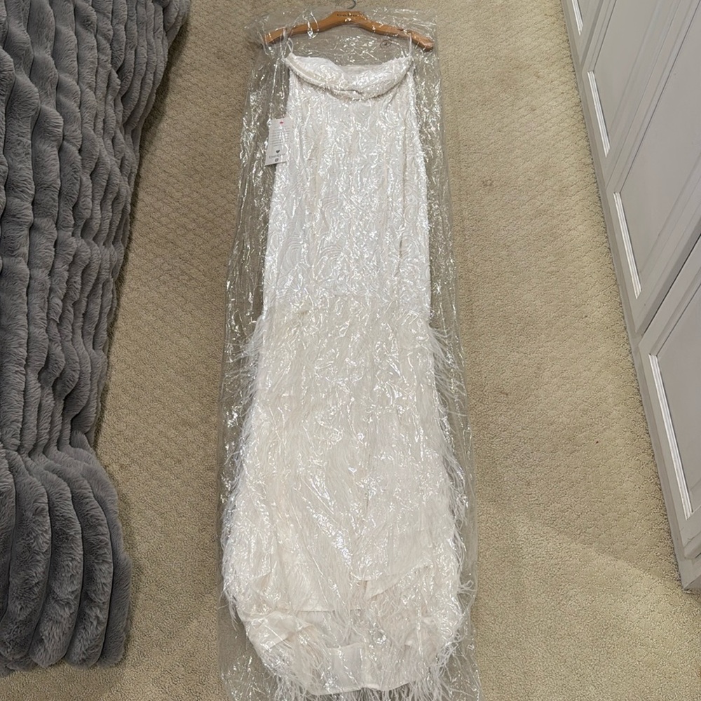 Brand New white Size 4 Bebe dress with tags and in the bag i bought it in
